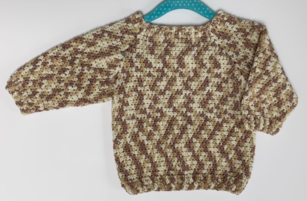 Sloane gender neutral baby jumper 6 months version in brown variegated yarn
