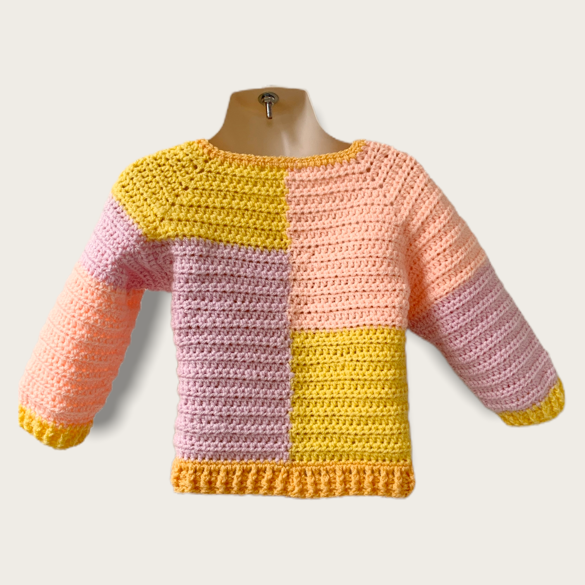image of BACK Reese sweater sample for 18 months in yellow, pink, orange colours